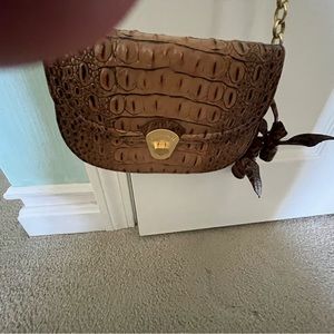 Brahmin convertible bag. Flower dodads attached. Measures 71/2x5hx2/14wide
